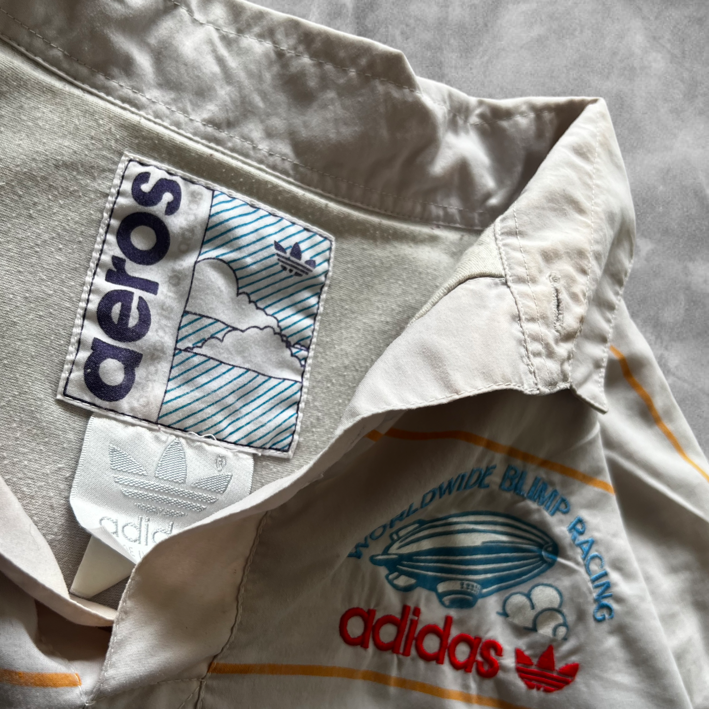 Multicolored Pinstripe Adidas World Wide Blimp Racing Pullover 1990s (XL)